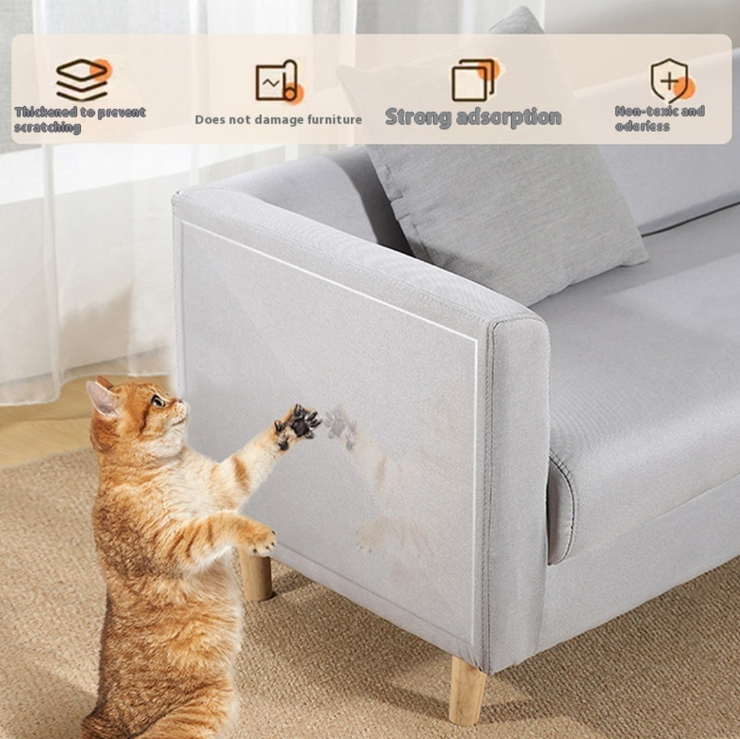 Ginger cat scratching a sofa covered with a clear protector