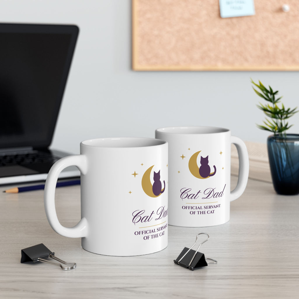 Cat Dad mug on a cosy table