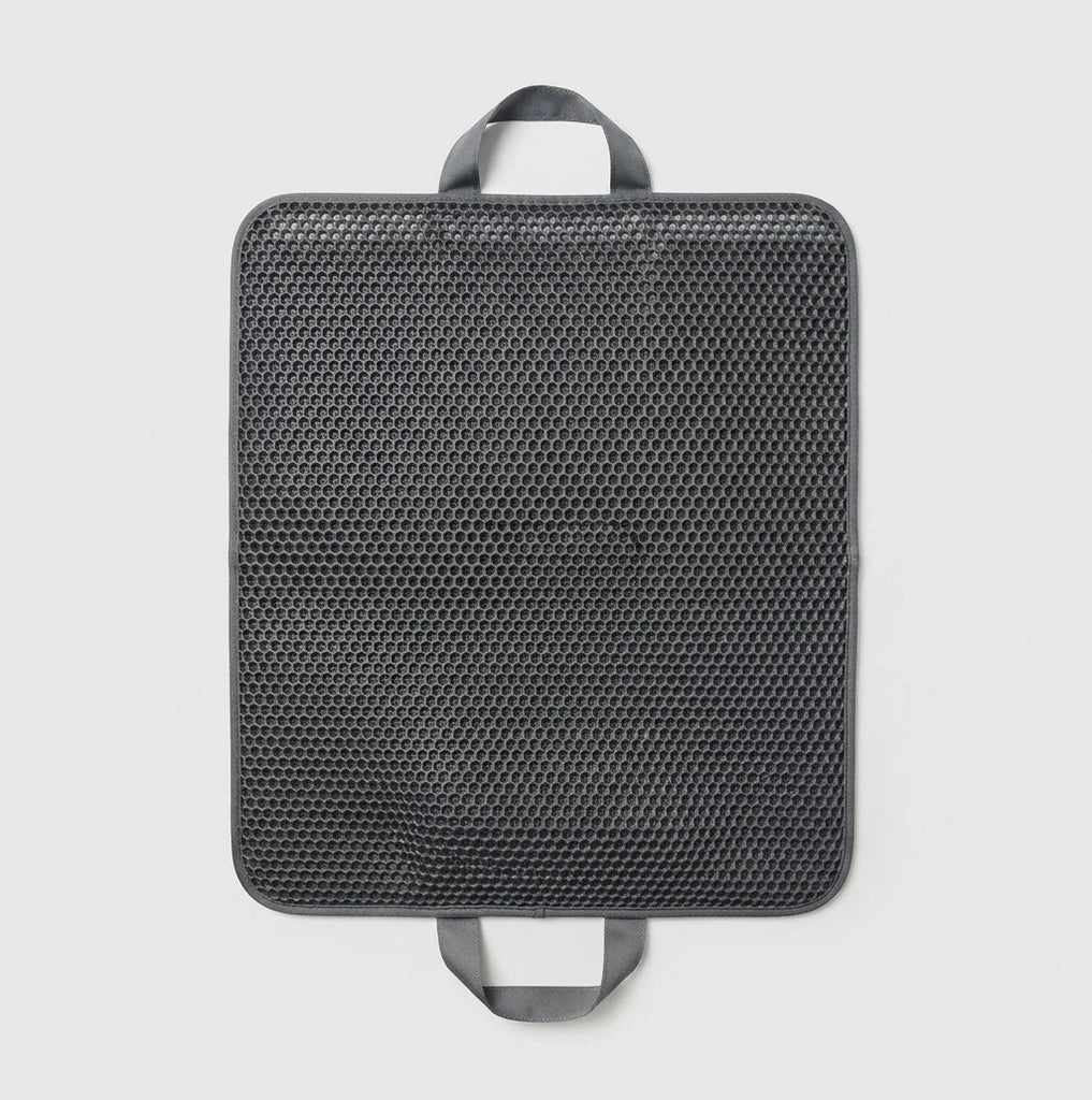 Honeycomb Litter Guard mat placed under a cat litter box