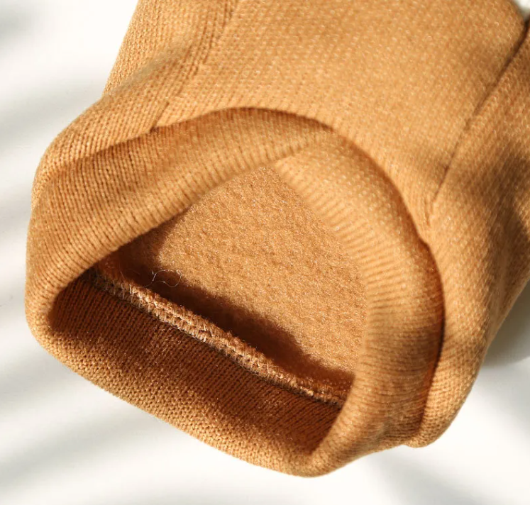 Soft inside lining of the knit cat sweater vest