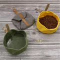 Foldable canvas travel bowls in green, grey and yellow