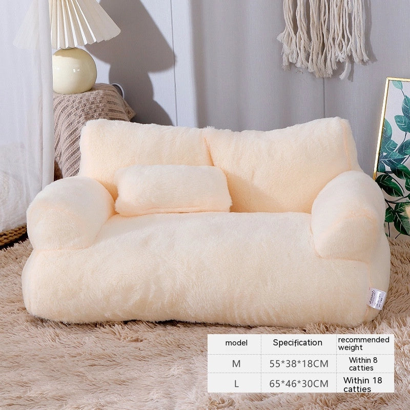 Luxury Plush Cat Bed in cream, a sofa-style bed with armrests and a bolster cushion, with a size chart for M and L